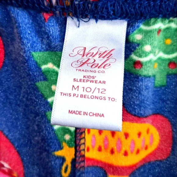 Christmas Pajamas Kid's M (10-12) Multicultural Santa Claus' - Picture 6 of 6